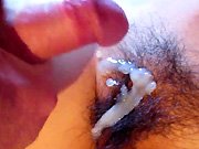 hairy pussy - He jerks off on his chick's hairy pussy